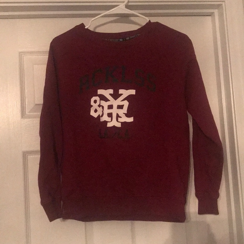 Young & reckless sweater